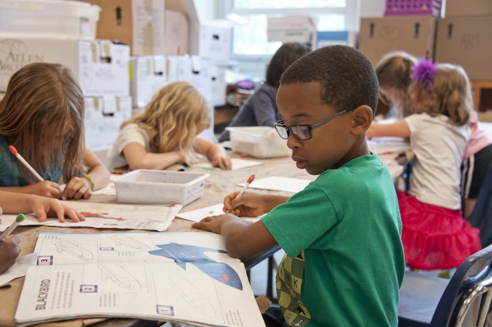 Child studying in class