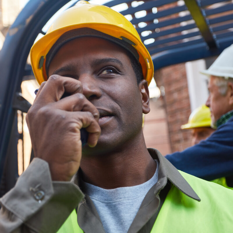 Safety worker using two-way radio