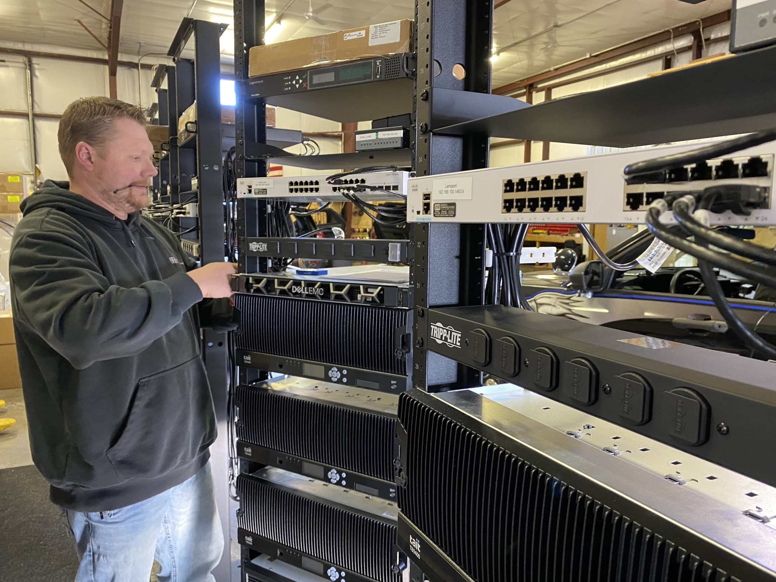 GenComm Employee Wiring a server