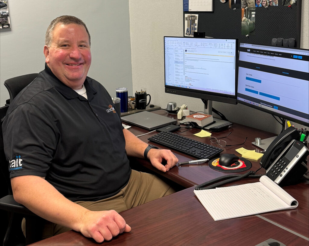 Jeff Heil sitting at his desk