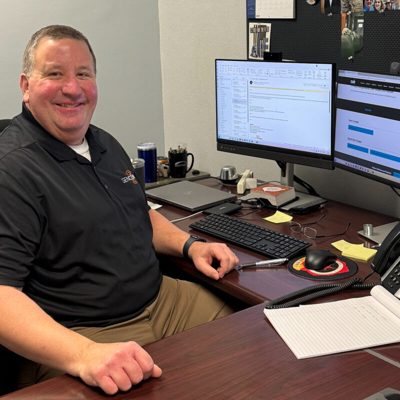 Jeff Heil sitting at his desk