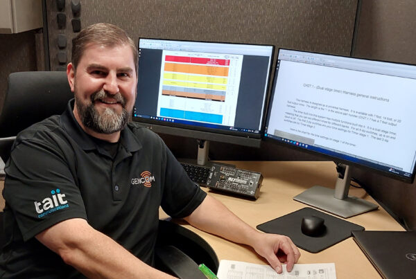 Bill Marr sitting at his desk