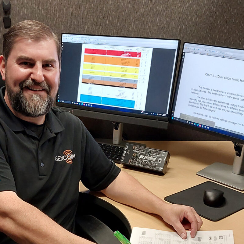Bill Marr sitting at his desk