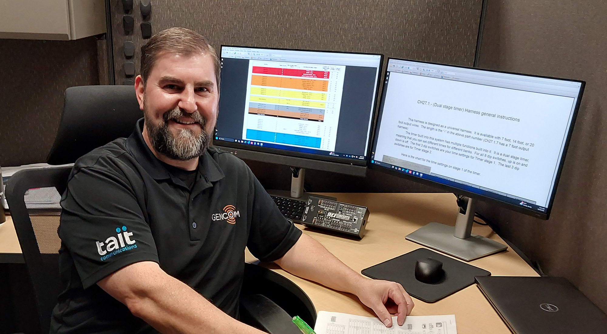 Bill Marr sitting at his desk
