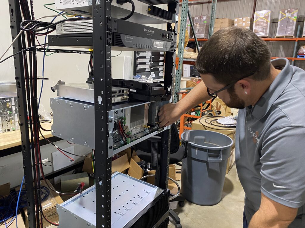 GenComm employee working on large radio system projects